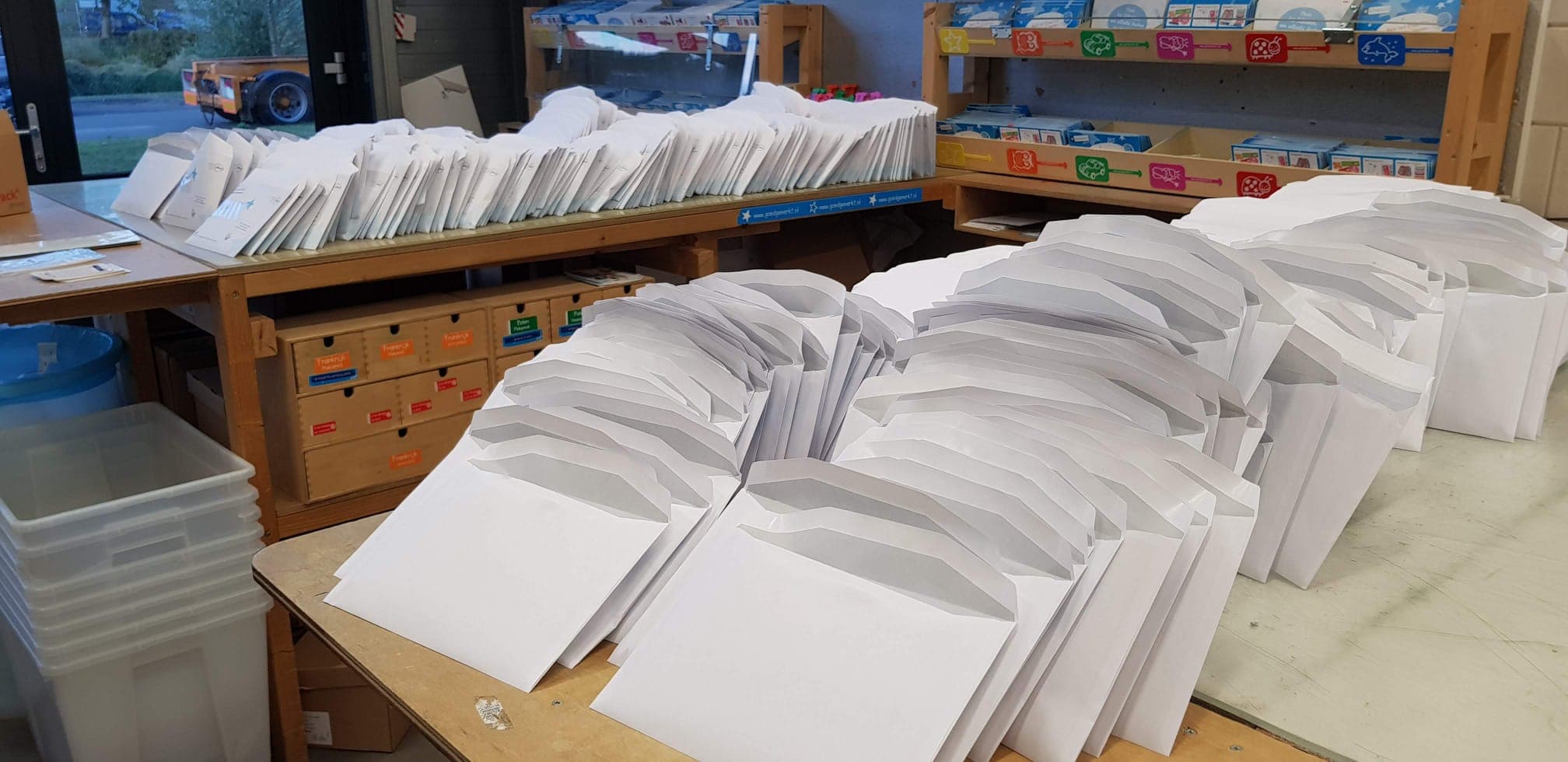 Team members packing customer orders in our former building