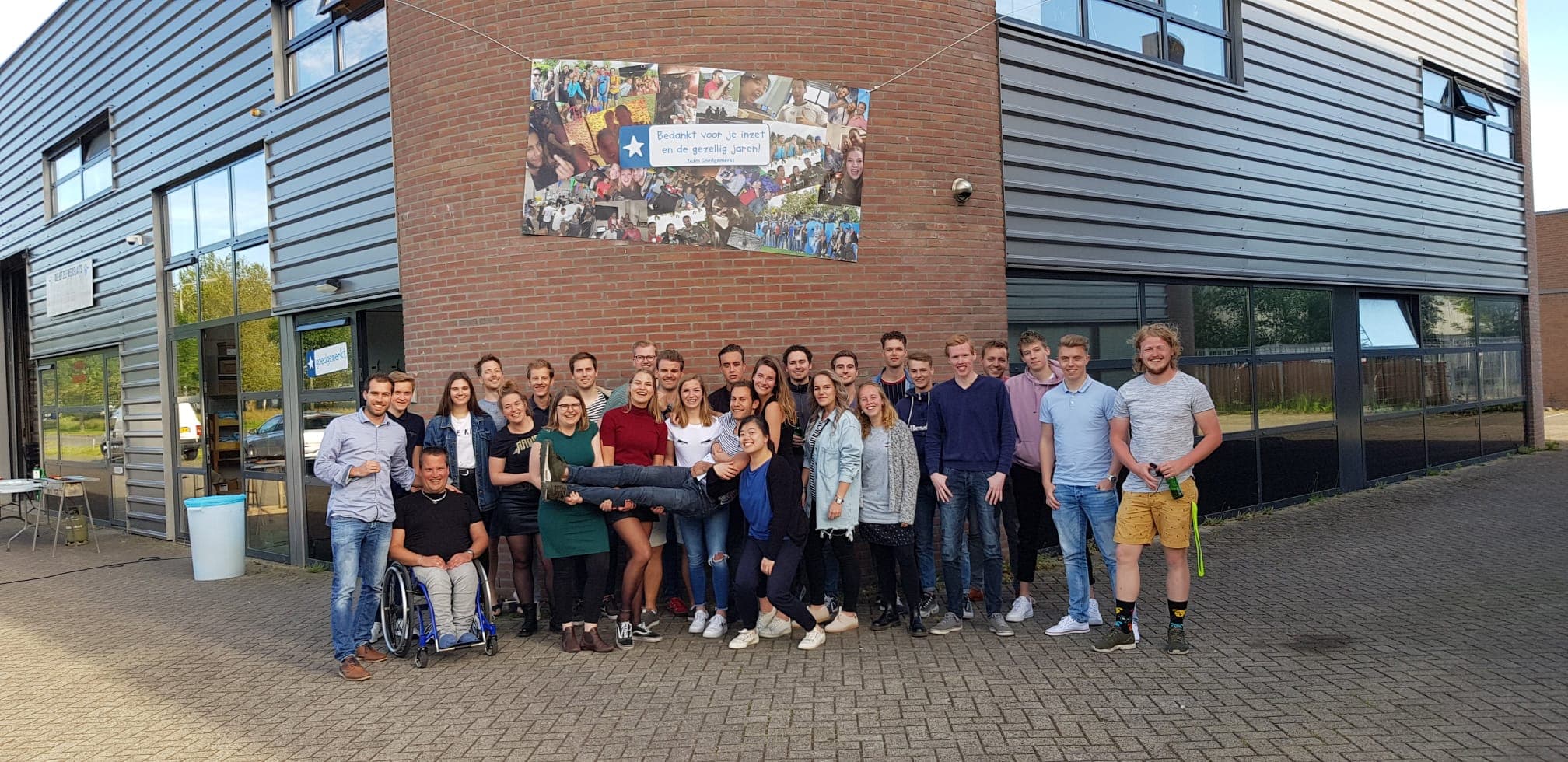 Our team in front of our first own building